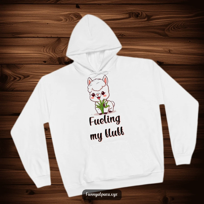 Funny Alpaca Hoodie: A content alpaca enjoys a tasty patch of grass, bringing cozy humor to your day.